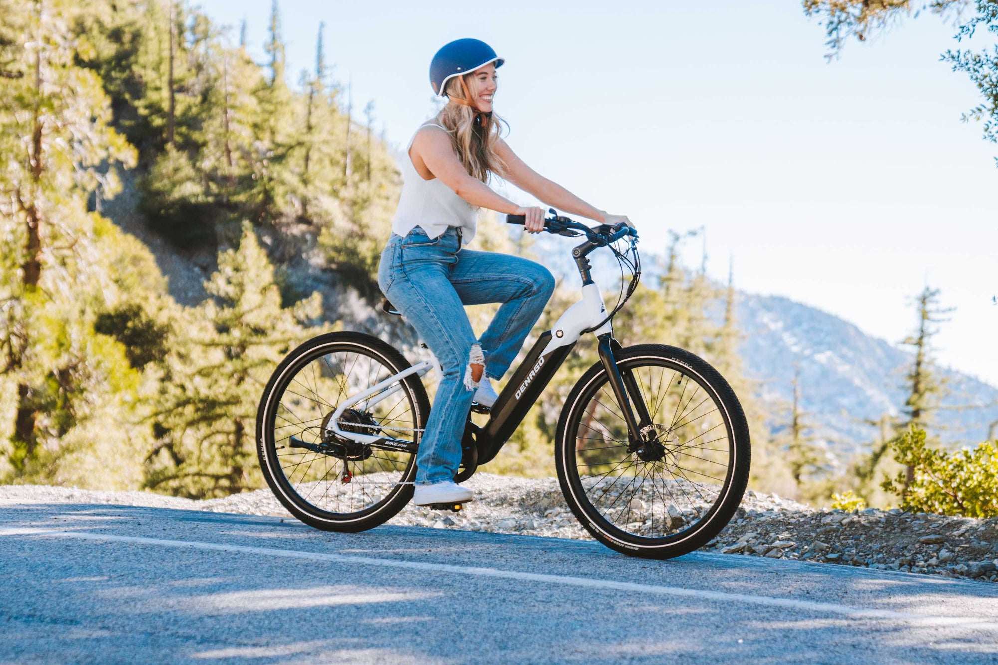 photo of a woman riding a Denago eBike during National Bike Month